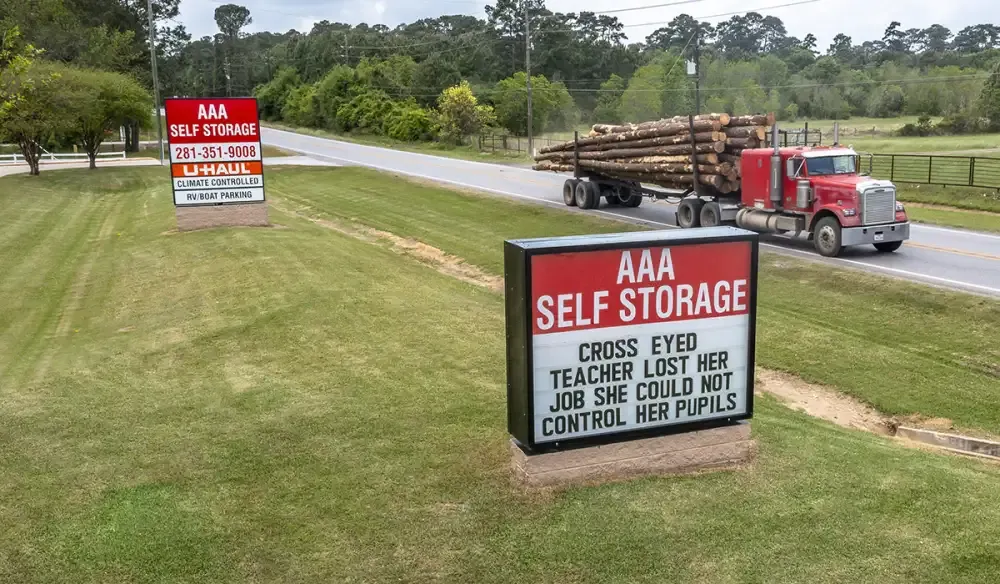 AAA Self Storage signage by the main road.
