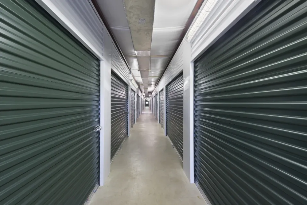 Indoor, climate-controlled storage hallway at AAA Self Storage.