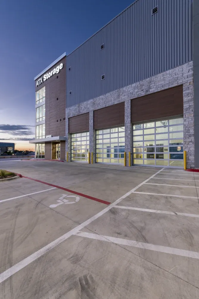Parking lot and entrance to loading zones at ATX Self Storage.