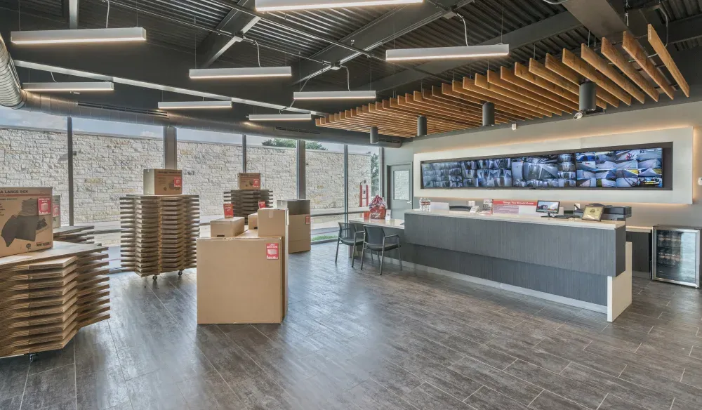 Moving boxes for sale in the rental office at Bergstrom Storage.