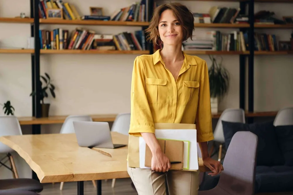 Woman holding business documents