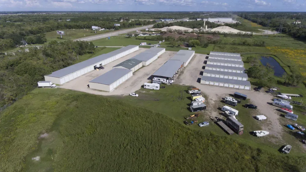 Aerial perspective of the Guardian Storage facility and its surroundings.