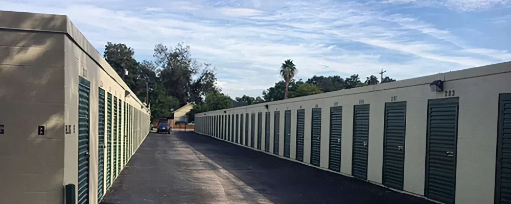 Aisle of drive-up storage units at Houston Self Storage.
