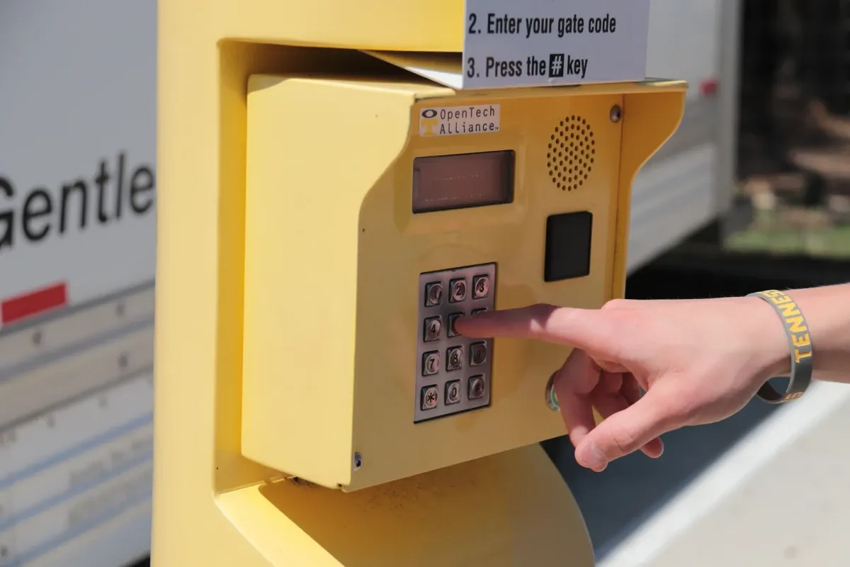 hand touching keypad at the Dripping Springs storage facility