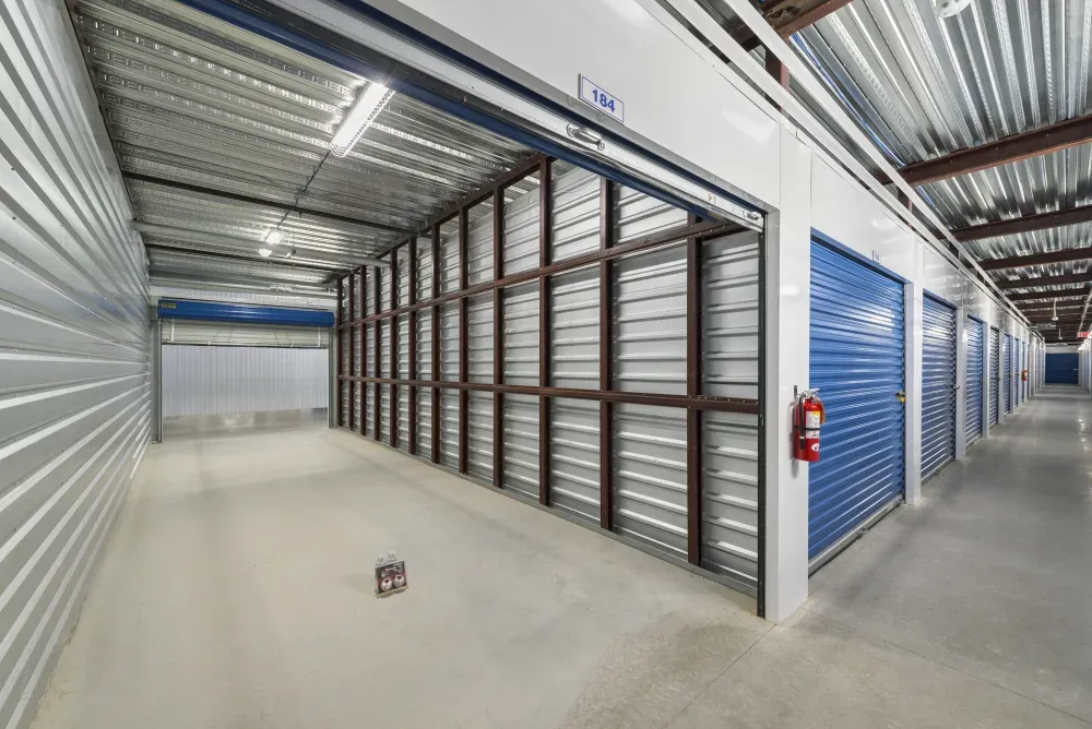Indoor storage with roll-up doors at New Braunfels Storage.