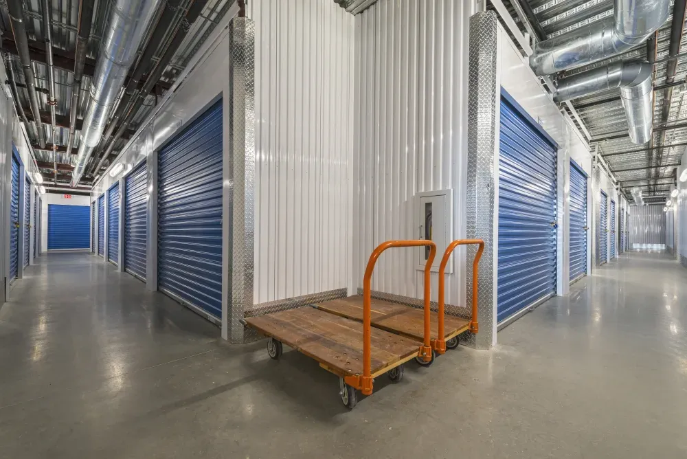 Indoor Storage units with carts at Westpointe New Braunfels Self Storage.