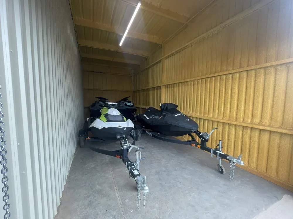 Fully-loaded storage unit interior at San Angelo Boat Storage.