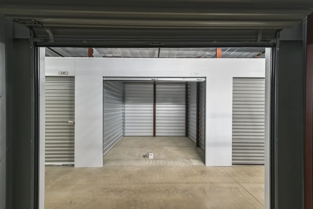 Indoor storage unit with roll-up doors at Storage Center at Craig Ranch.