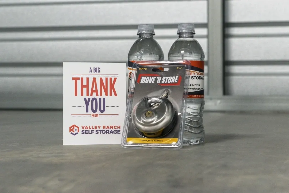 Welcome bundle in a new storage unit with a "thank you" sign at Valley Ranch Storage.