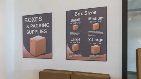 Box supply size poster at Memorial Drive Storage.
