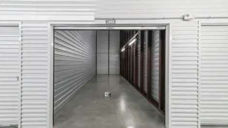 Open indoor storage unit at Memorial Drive Storage.