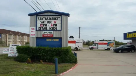 Santa market dates on self storage main sign