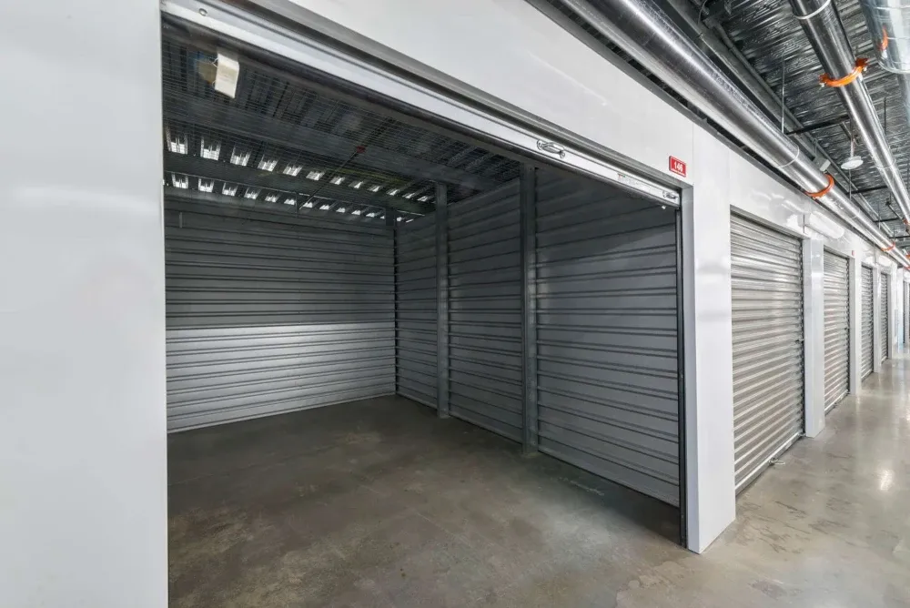 Climate-controlled storage units with roll-up doors at Frisco Self Storage.